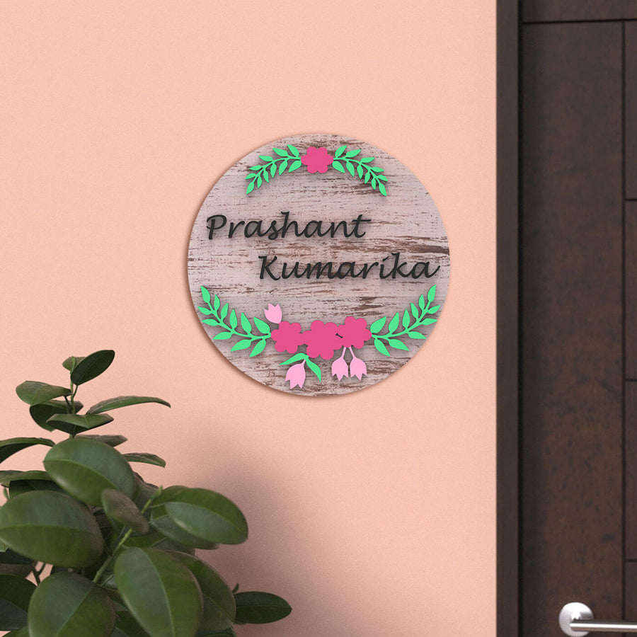 Handcrafted Distressed Circular Name Plate Pastel Pink - Wall Mounted Name Personalization Example