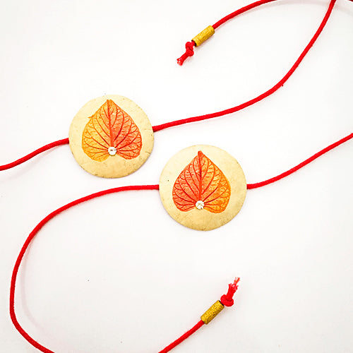 Handcrafted Papier Mache Rakhis Set Of 2 11 - Close-up of pair on white background
