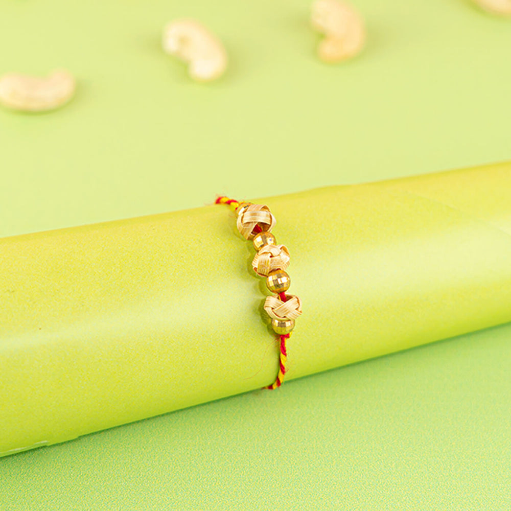 Ecofriendly Bamboo Weaved Quilled Motif Rakhi - Wrapped on cylindrical display