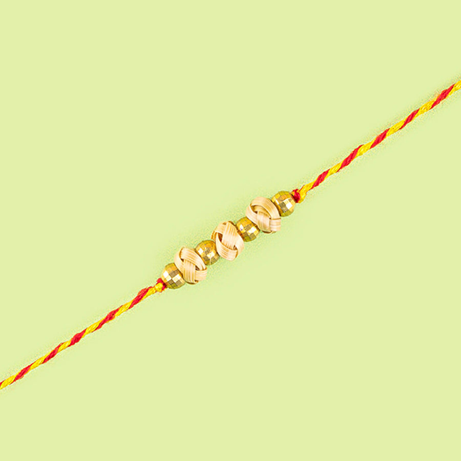 Ecofriendly Bamboo Weaved Quilled Motif Rakhi - Close-up of Rakhi beads