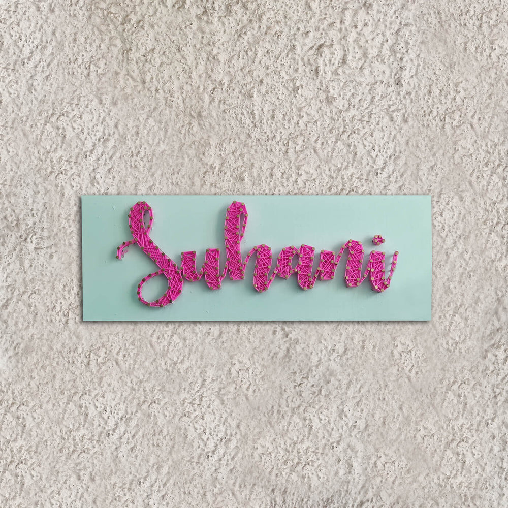 Personalised String Art Name Plate - Mounted on Textured Wall Front View