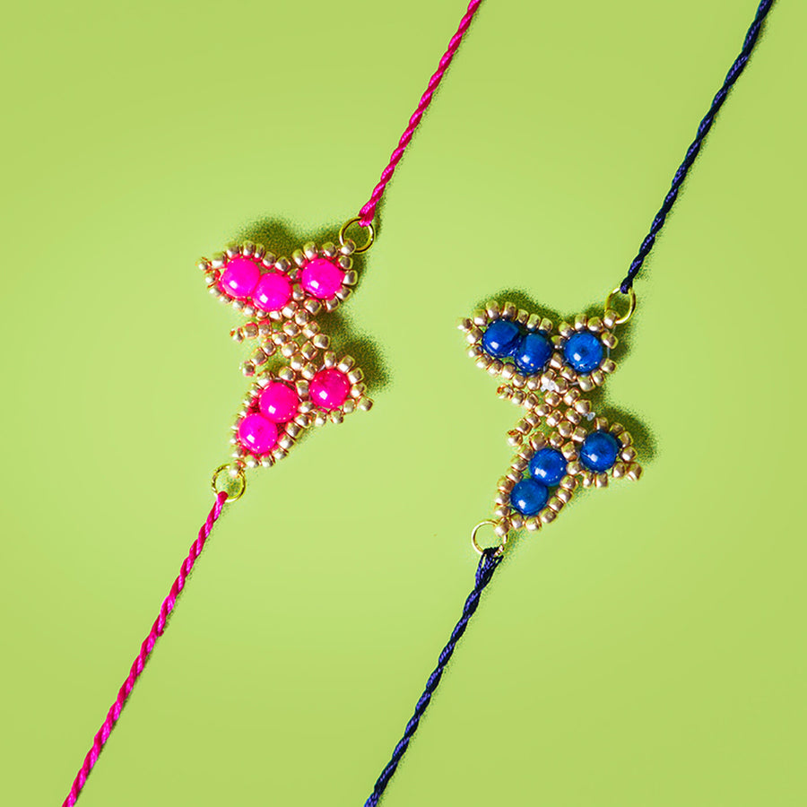 Handcrafted Butterfly Rakhi Set Of 2 - Close-up of bead detail