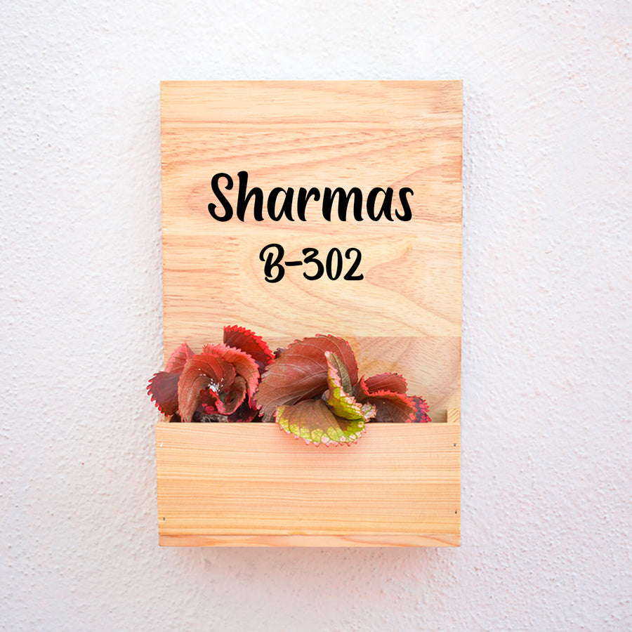 Pine Wood Planter Name Plate Couple Name - Front View Mounted on Textured Wall