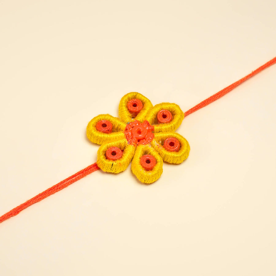Paper Mache Rakhi Yellow Blossom - Close-up View of Rakhi Flower