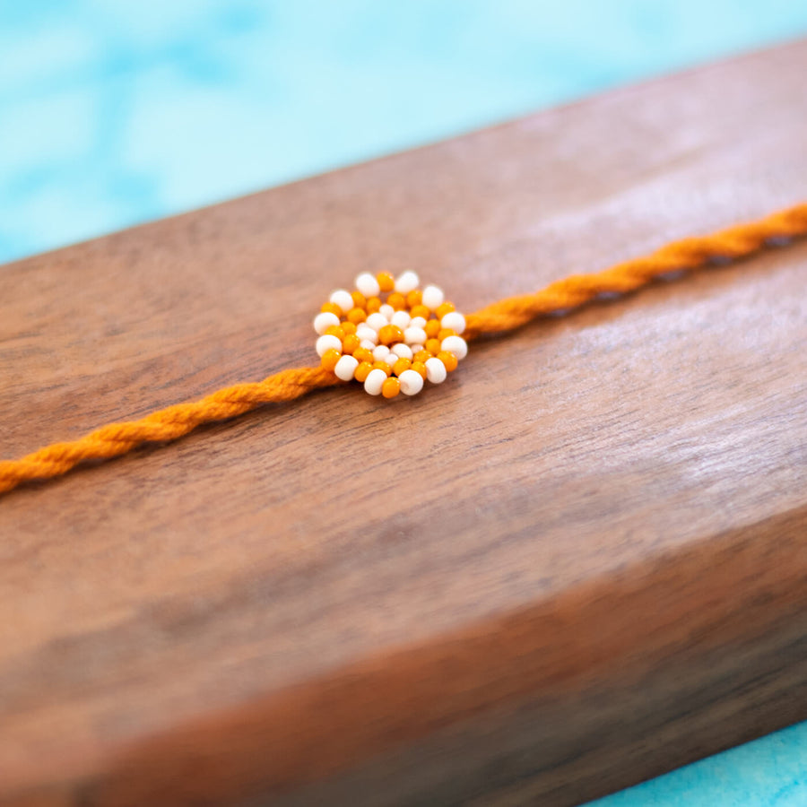 Chaand Collection Glass Beeds Rakhi Orange - Close-up of Beaded Detail