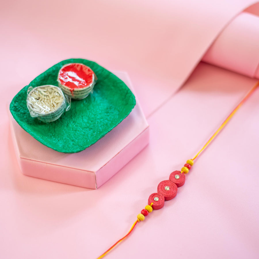 Paper Mache Rakhi Hamper - Rakhi with rice and roli plate