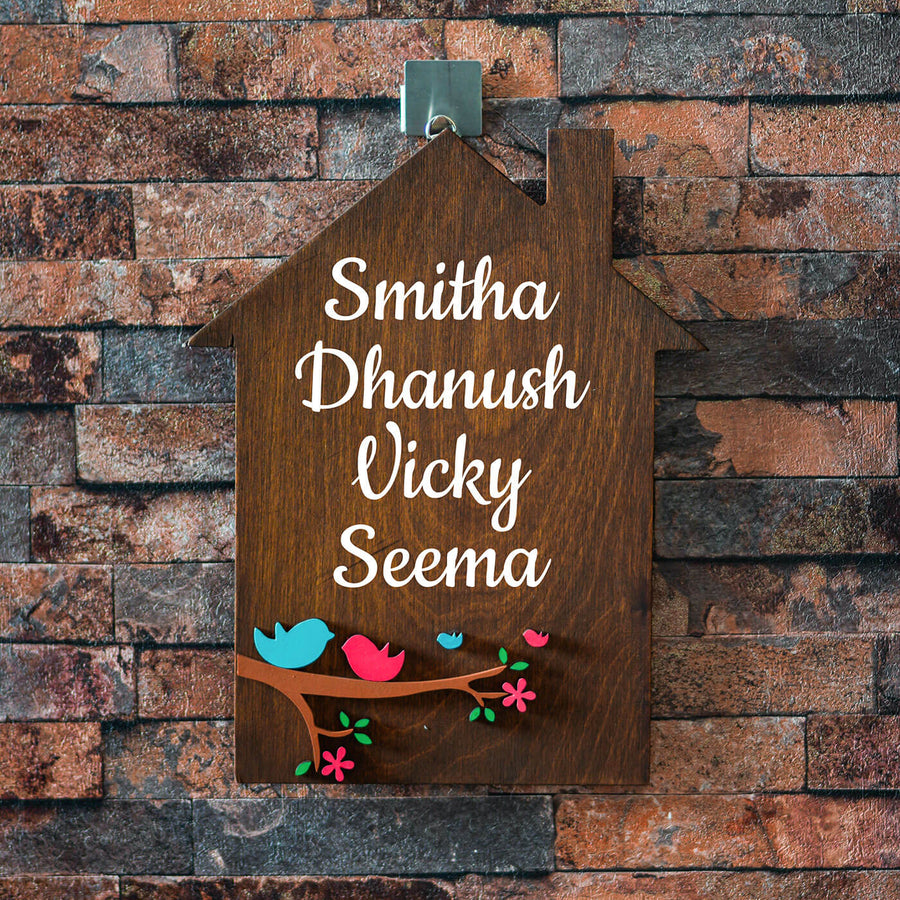 House Shaped Name Plate For Family - Hanging on Hook Against Wall