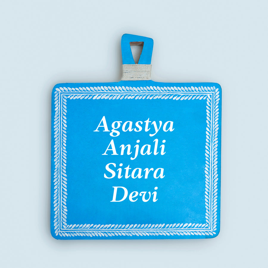 Hand Painted Aipan Art Wooden Personalised Square Name Plate - Front View on Flat Surface