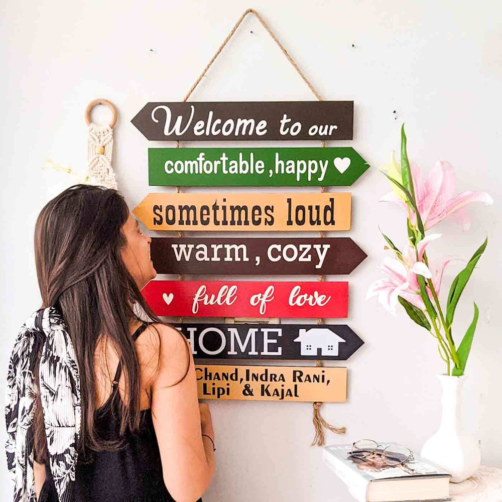 Welcome Board With Four Names - Mounted on Wall with Person
