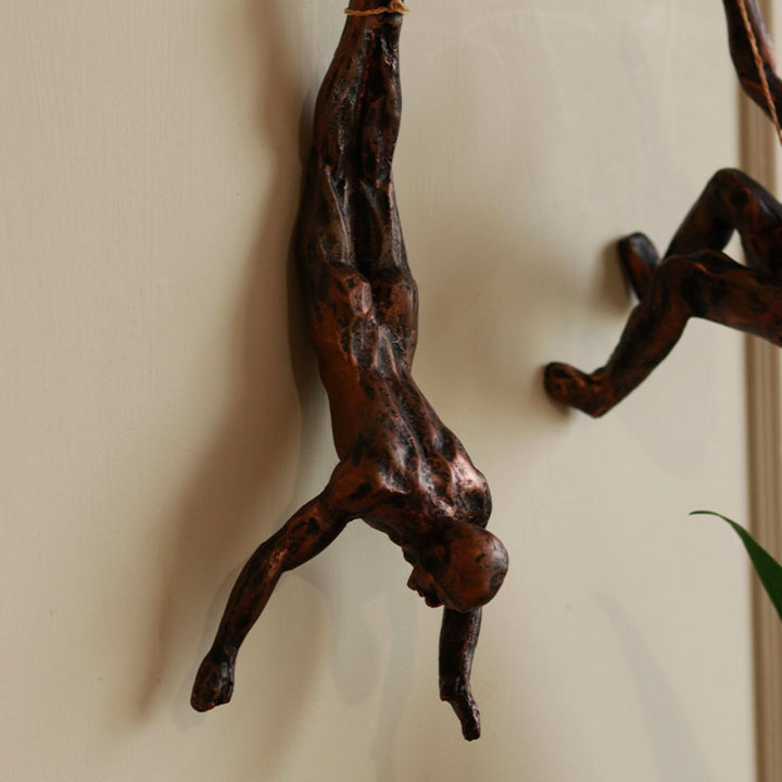 Handcrafted Hanging Man Ceramic Centerpiece