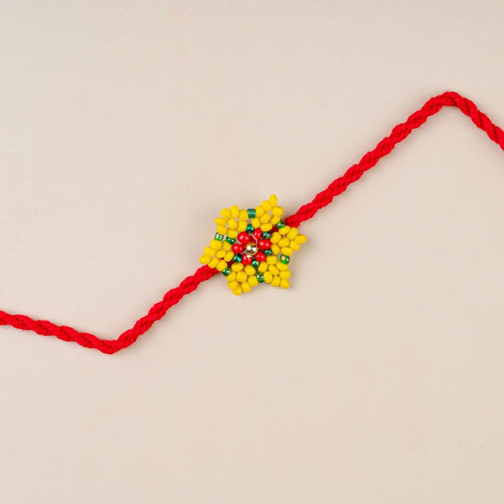 Handcrafted Glass Beads Sitara Rakhi 7 - Close-up of rakhi thread design
