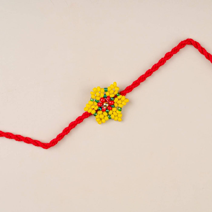 Handcrafted Glass Beads Sitara Rakhi 7 - Close-up of rakhi thread design