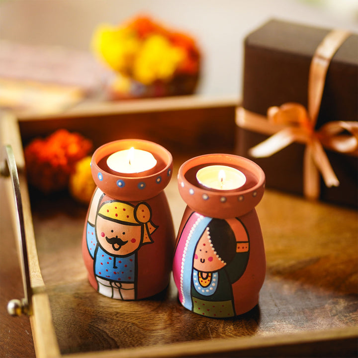 Handpainted Clay Tealight Holders with Regional Characters