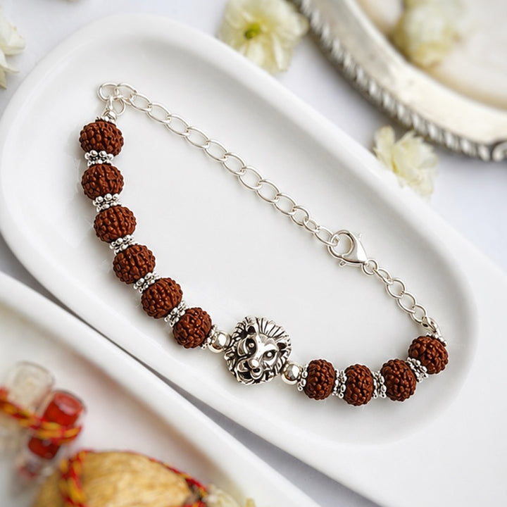 Handcrafted Brass Lion Rudraksha Rakhi With Roli Chawal For Brother
