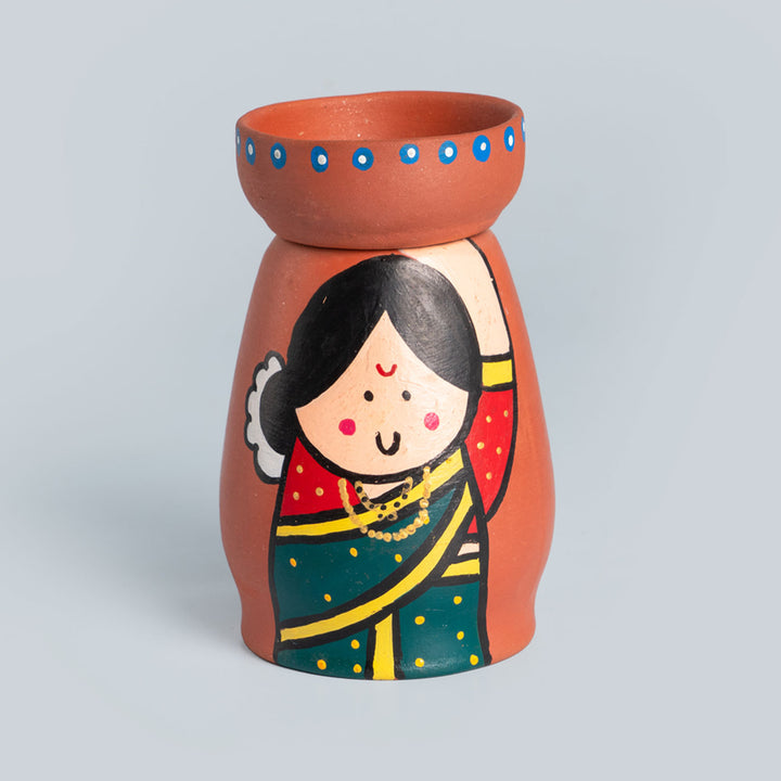 Handpainted Clay Tealight Holders with Regional Characters