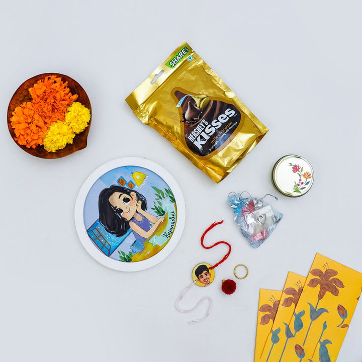 Handpainted Personalized Caricature Rakhi Hamper With Caricature Nameplate 1 - Flat Lay Product Arrangement