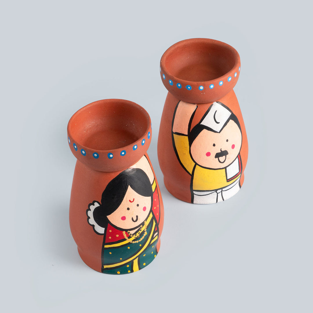 Handpainted Clay Tealight Holders with Regional Characters