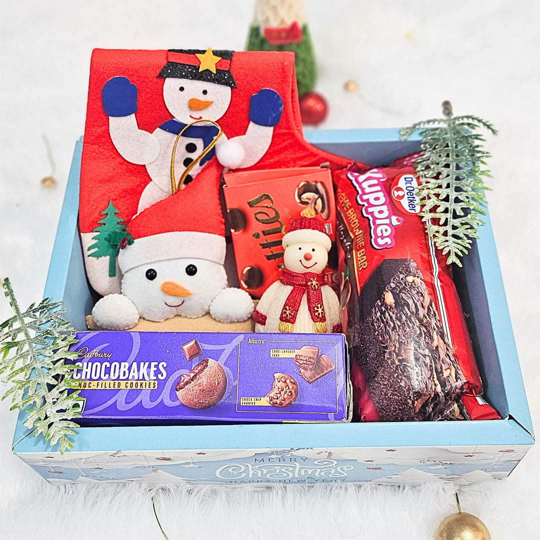 Personalized Christmas Gift Hamper | Includes 1 Ornament, 1 Stocking, 1 Snowman Candle, 1 Brownie Cake, 1 Cadbury Chocobakes, 1 Nutties Pack