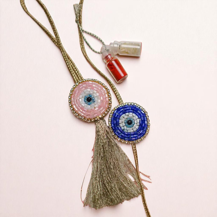 Handmade Beaded Evil Eye Bhaiya Bhabhi Rakhi With Roli Chawal Set Of 2 - Flat Lay Full Product