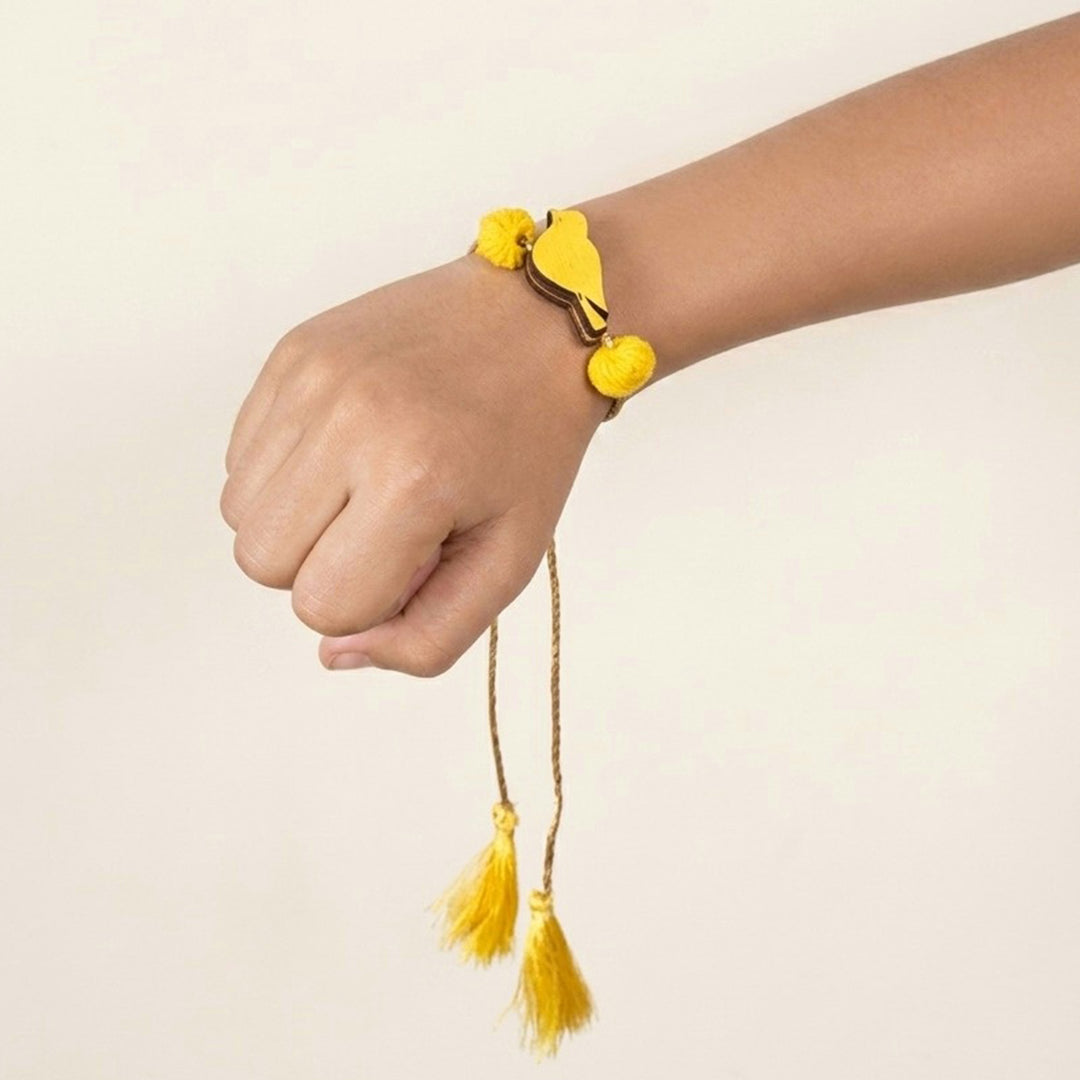 Handcrafted Bird Motif Beaded Tassel Rakhi - Yellow