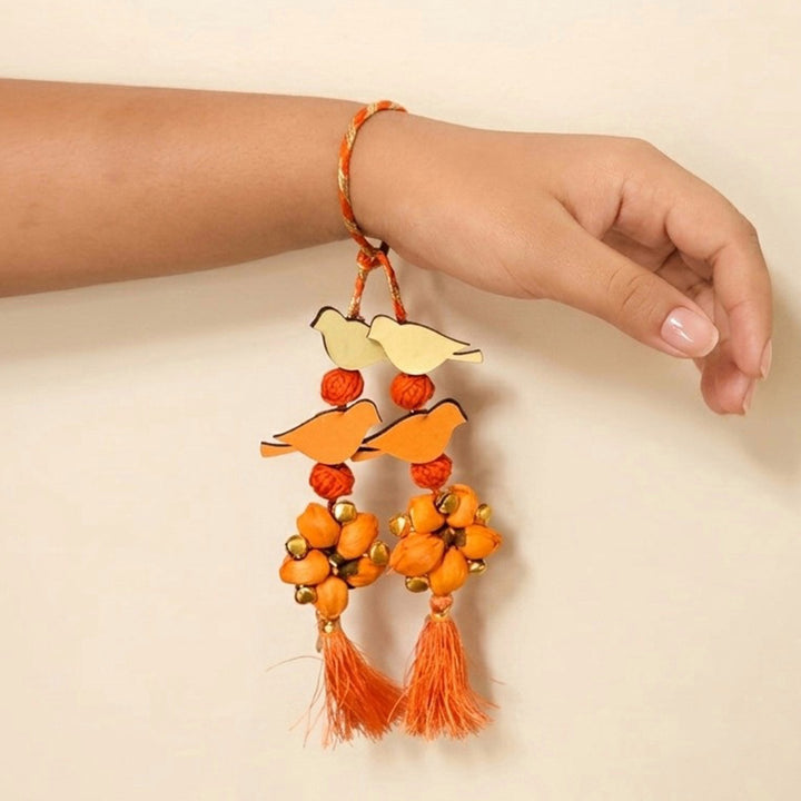 Handcrafted Bird Motif Shola Beaded Tassel Lumba Rakhi for Bhabhi - Orange