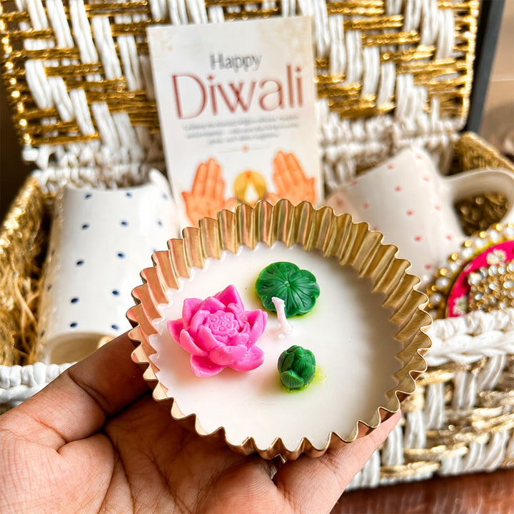 Ruby & Azure Golden Basket Diwali Gift Hamper With Red And Blue Tumbler And Small Urli Candle For Festive Gifting