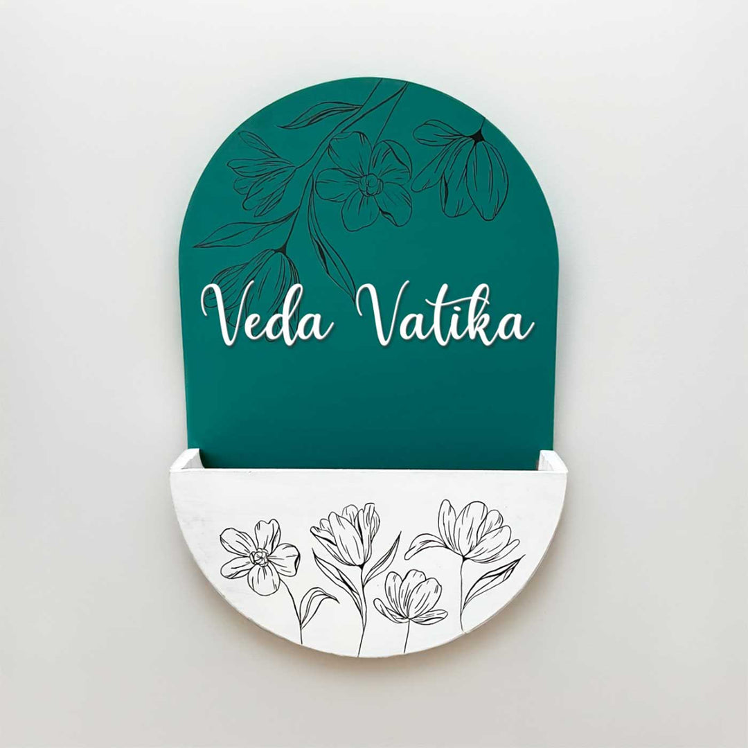 Personalized Handmade White And Green Floral Mdf Wood Name Plate - Front View Hanging on Wall