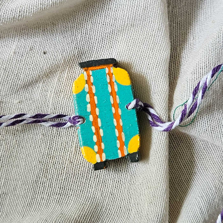 Handpainted Quirky Wooden Rakhi With Roli Chawal 1 New - Close-up of Single Charm with String