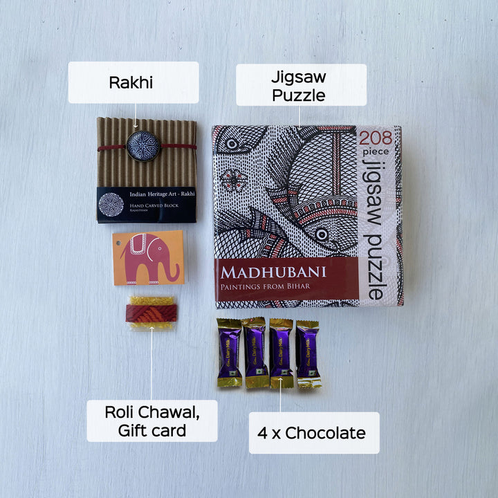 Handcrafted Folk Art Rakhi Hamper For Kids With Rice Roli Haldi 3 - Labeled contents laid flat