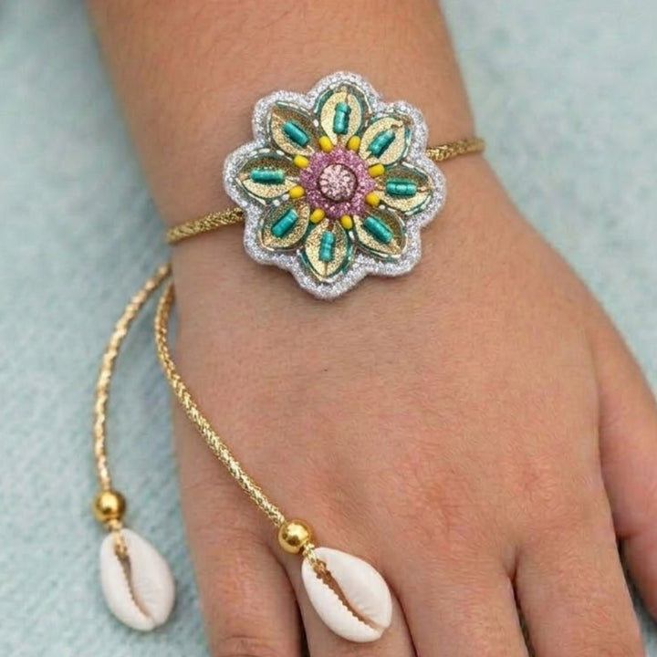 Handmade White Flower Ghungroo & Shell Felt Rakhi For Brother