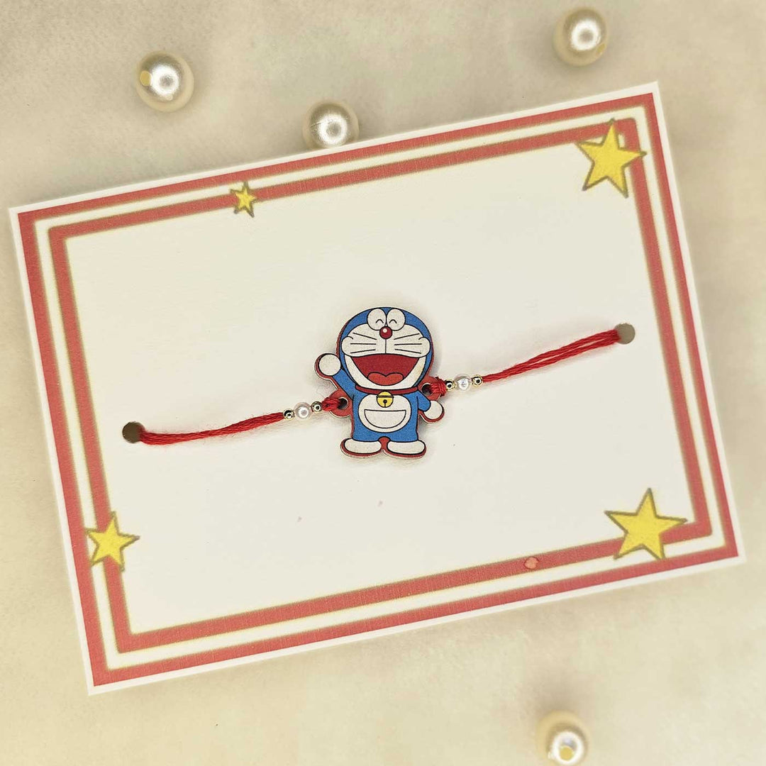 Handmade Doraemon Mdf Wood Kids Rakhi With Roli Chawal - Displayed on Gift Card