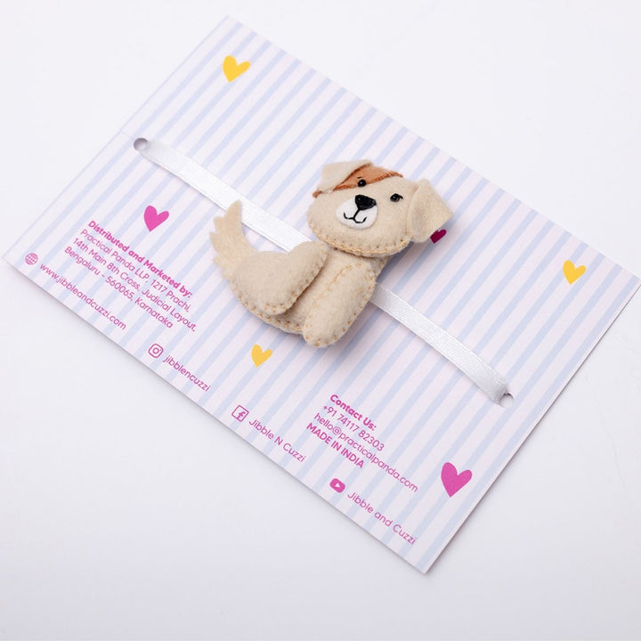 Handmade Pawsome Pup Felt Kids Rakhi - Angled Side View with Product and Card
