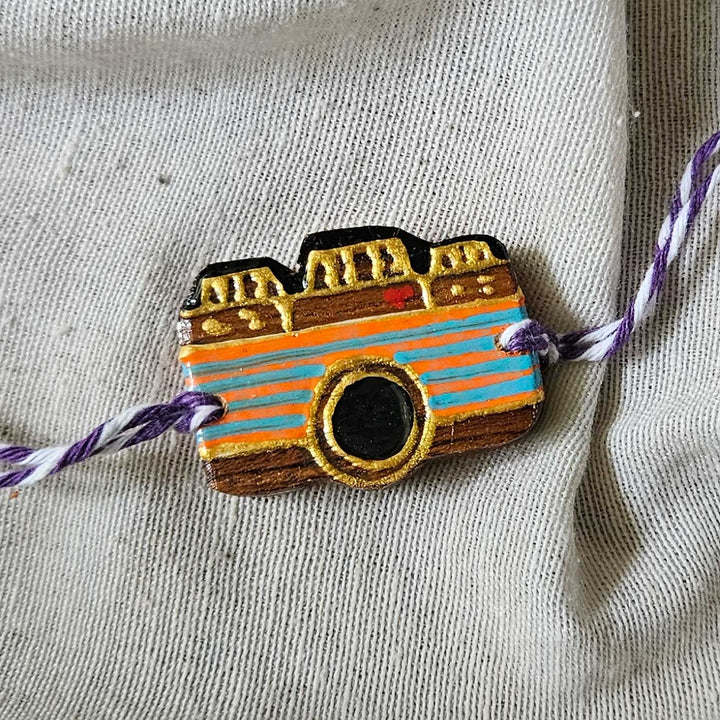 Handpainted Quirky Wooden Rakhi With Roli Chawal 7 - Front Close-up