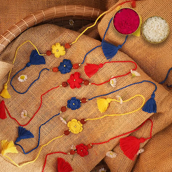Handmade Crochet Flower And Rudraksh Rakhi With Roli Chawal Set Of 6 - Bracelets with Colorful Tassels