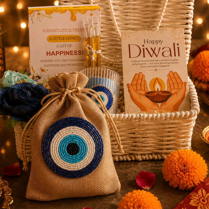 Ivory Nazar White Jute Basket Diwali Gift Hamper With Evil Eye Soy Wax Candle And Shubh Labh Potli For Festive Gifting