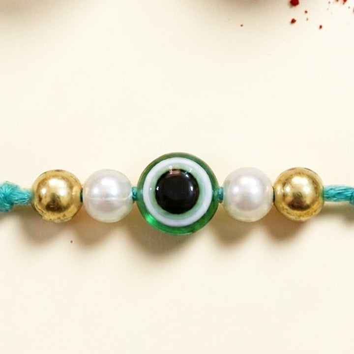 Handmade Evil Eye Turquoise Premium Agate Rakhi With Roli Chawal, Nariyal And Gift Box For Brother
