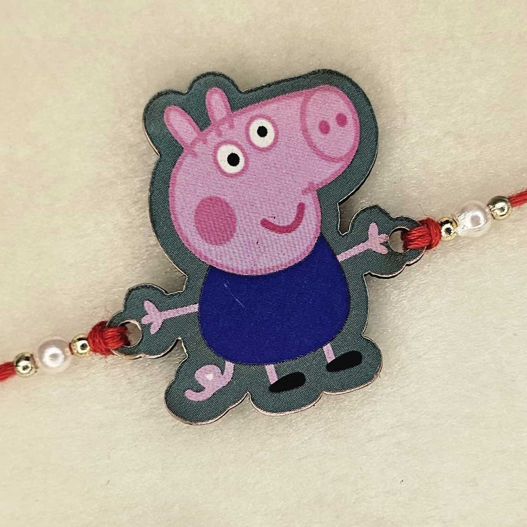 Handmade Peppa Pig Mdf Wood Kids Rakhi With Roli Chawal - Front View of Boy Character