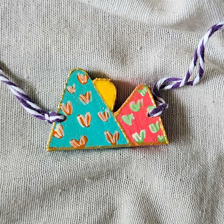 Handpainted Quirky Wooden Rakhi With Roli Chawal 9 New - Close-up Front View