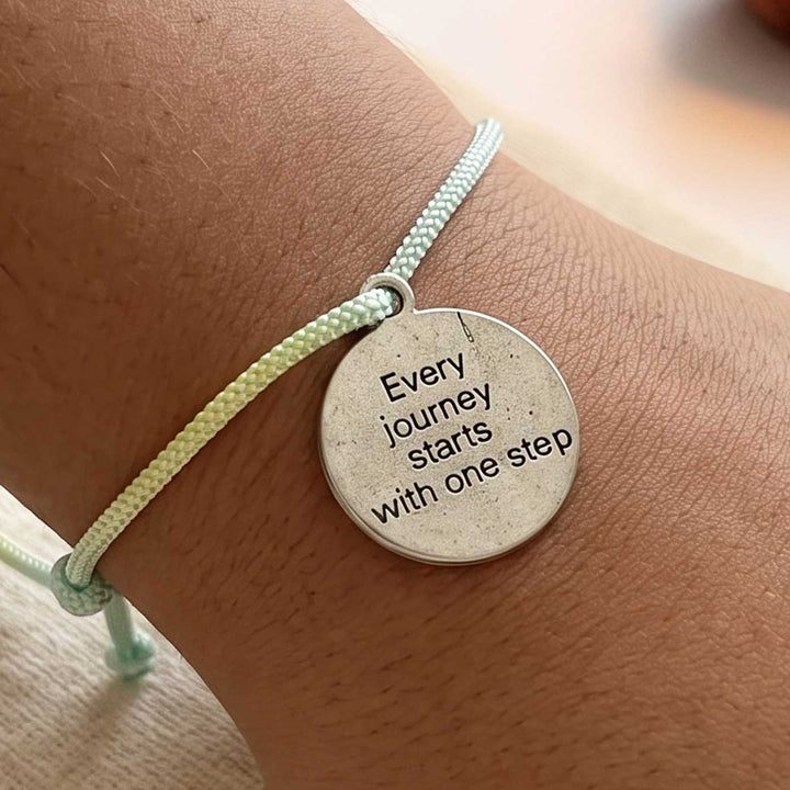 Engraved "Every Journey Starts With One Step" Quote Metal Charm Rakhi With Roli Chawal for Brother