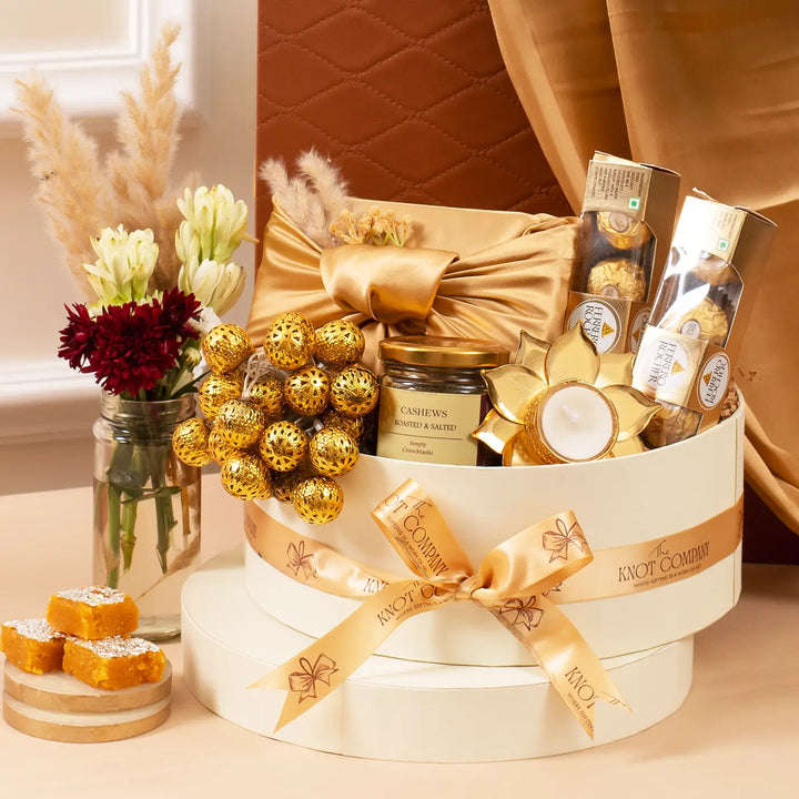 Golden Gleam of Diwali Gift Hamper | Includes 1 Fairy Light, 1 Cashews Jar, 1 Lotus Tealight Holder, 1 Kaju Katli, 2 Ferrero Rocher Boxes, 1 Gift Box