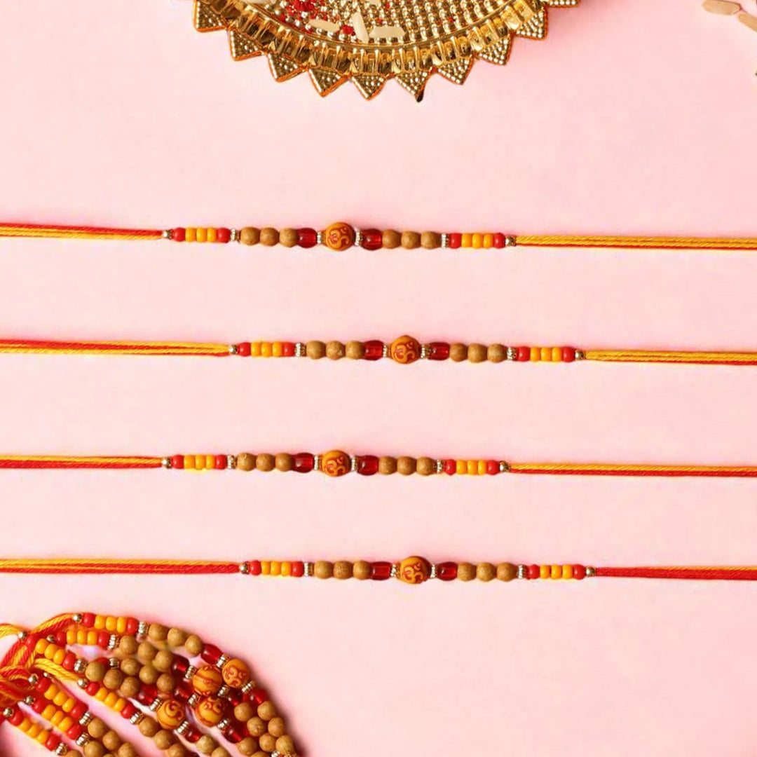 Handmade Om Dori Rakhi With Roli Chawal | Set Of 12