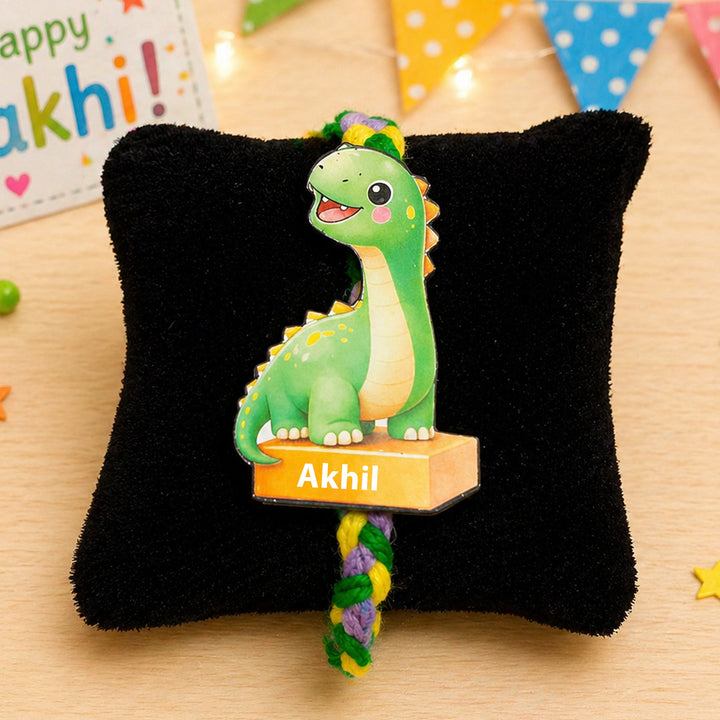 Personalized Reusable Green Dino MDF Wood Rakhi With Roli Chawal