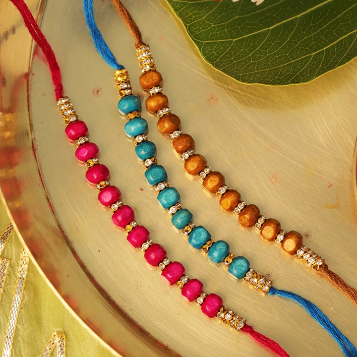 Handmade Beaded Wooden Rakhi With Roli Chawal | Set Of 3