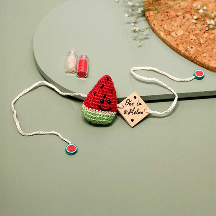 Handmade Crochet One In A Melon Kids Lumba Rakhi With Roli Chawal - Single Watermelon Charm Necklace Front View