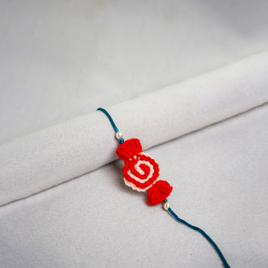 Quirky Handcrafted Crochet Rakhi With Roli Chawal For Kids 1 - Close-up of Single Rakhi