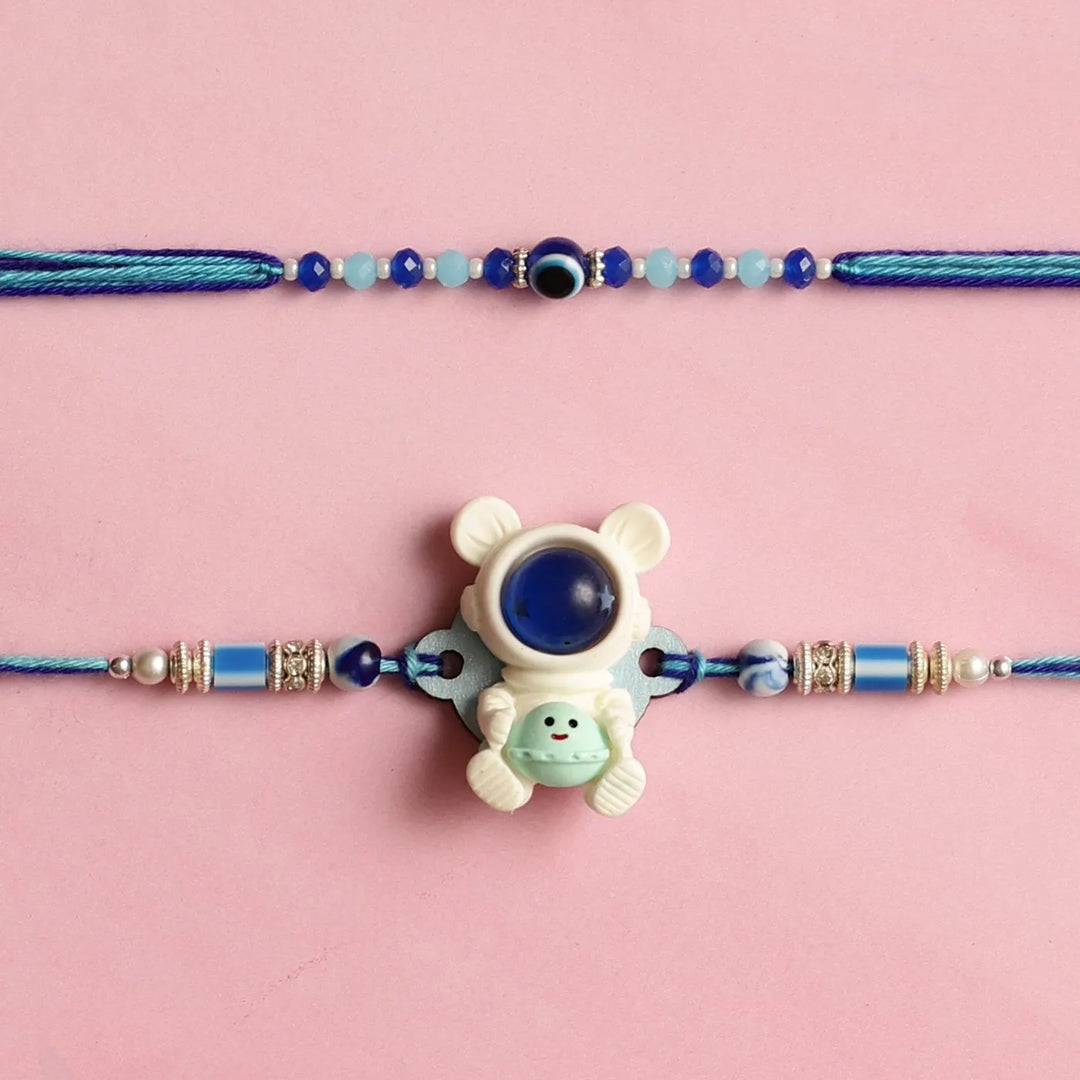 Handmade Astronaut & Evil Eye Kids Rakhi With Roli Chawal | Set Of 2