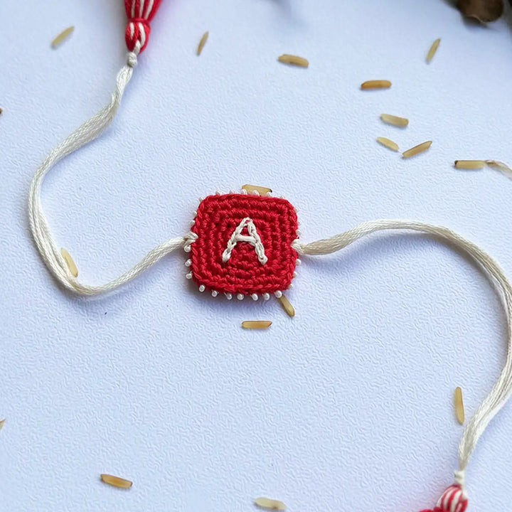 Personalized Handmade Crochet Red & White Initial Rakhi With Roli Chawal