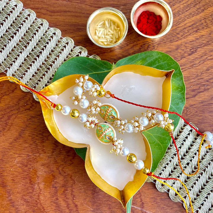 Handmade Green Oval Design Pearl And Stone Bhaiya Bhabhi Rakhi - Front View with Accessories
