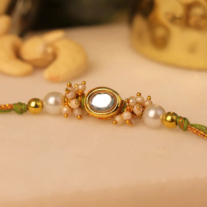 Handmade Solitaire Kundan Rakhi With Roli Chawal