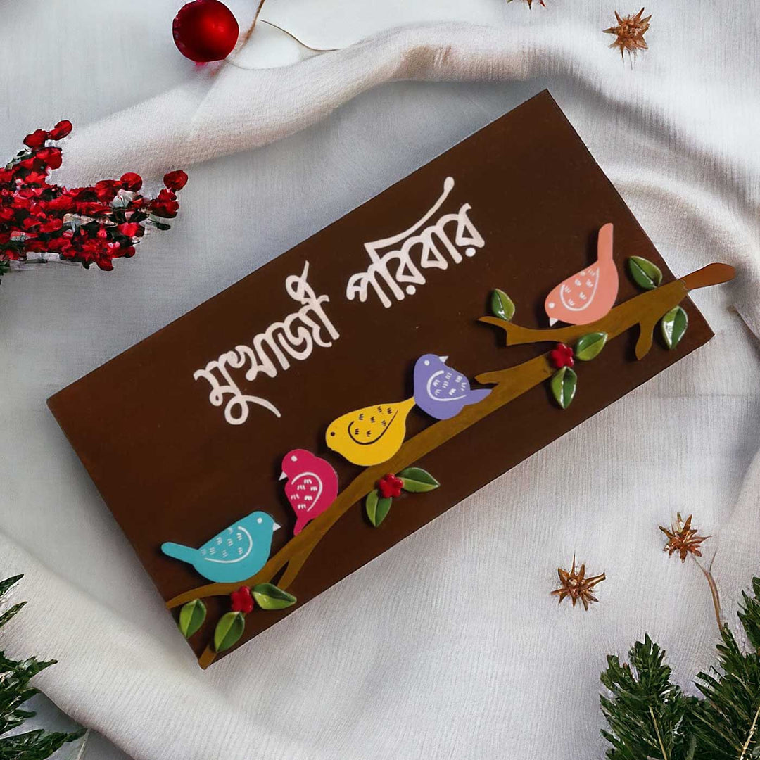 Personalized Handmade Birds On A Branch Rectangle Mdf Wood Name Plate - Top Angle with Decorative Surroundings